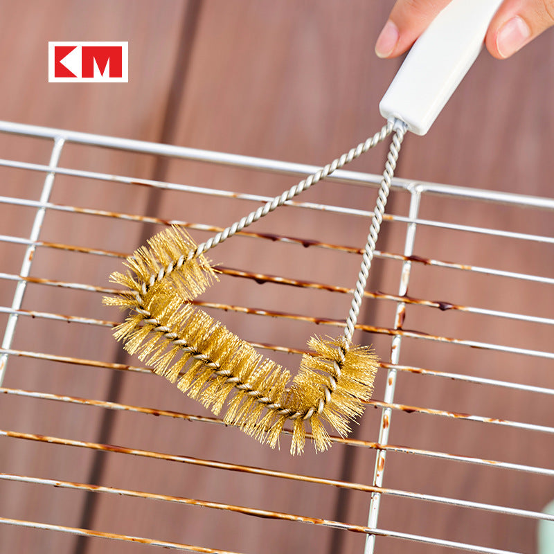 BBQ grill cleaning brush with long ergonomic handle for comfortable outdoor use.