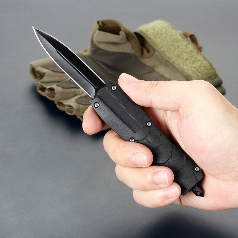 Multifunctional pocket knife blade close-up showing sharp precision steel edge.