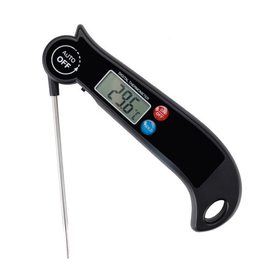 Digital cooking thermometer close-up showing electronic display and stainless steel probe.