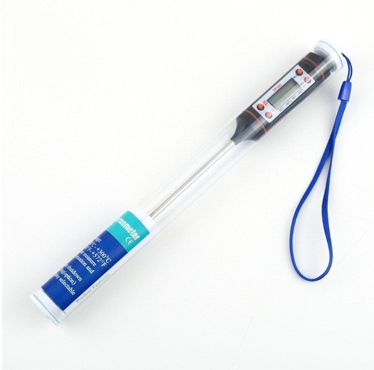 Digital BBQ thermometer close-up showing LCD temperature display for grilling and smoking