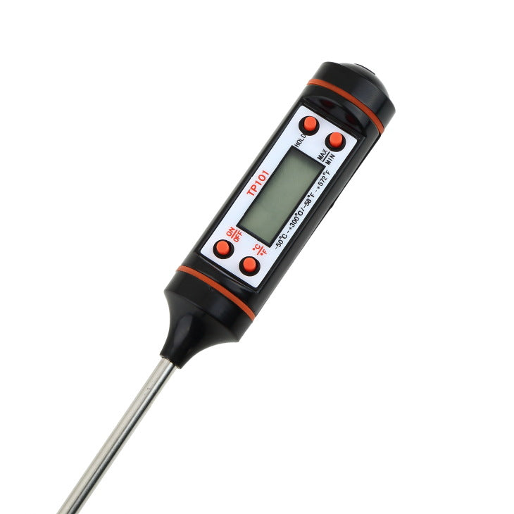 Wireless Bluetooth BBQ probe thermometer monitoring meat temperature on grill during outdoor cook