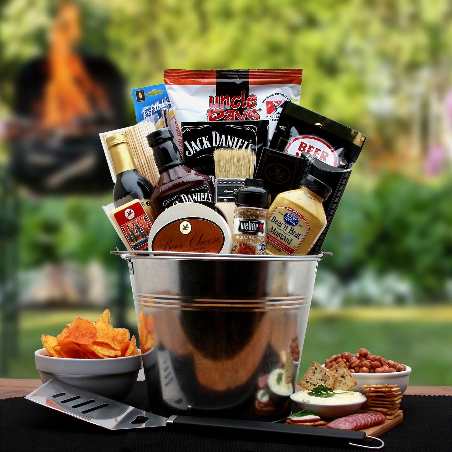 BBQ Lovers Gift Pail with assorted sauces, snacks, seasonings and grilling tools