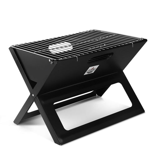 Compact charcoal BBQ grill with chrome-plated cooking grate and easy setup