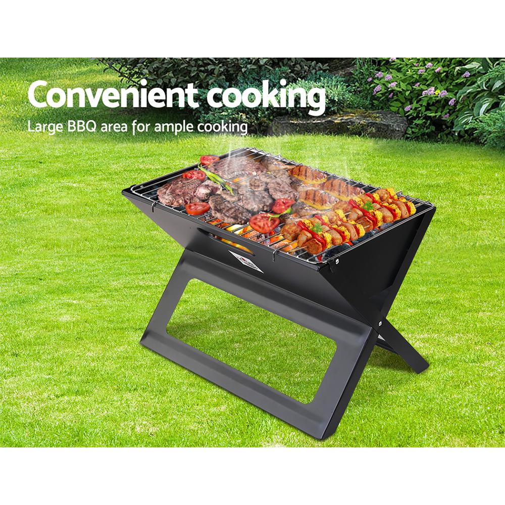 Portable Grillz charcoal BBQ smoker with carry handle and foldable legs